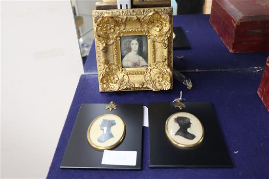 A 19th Century English School miniature portrait of a young lady in ornate gilt frame and two silhouette portraits (3)